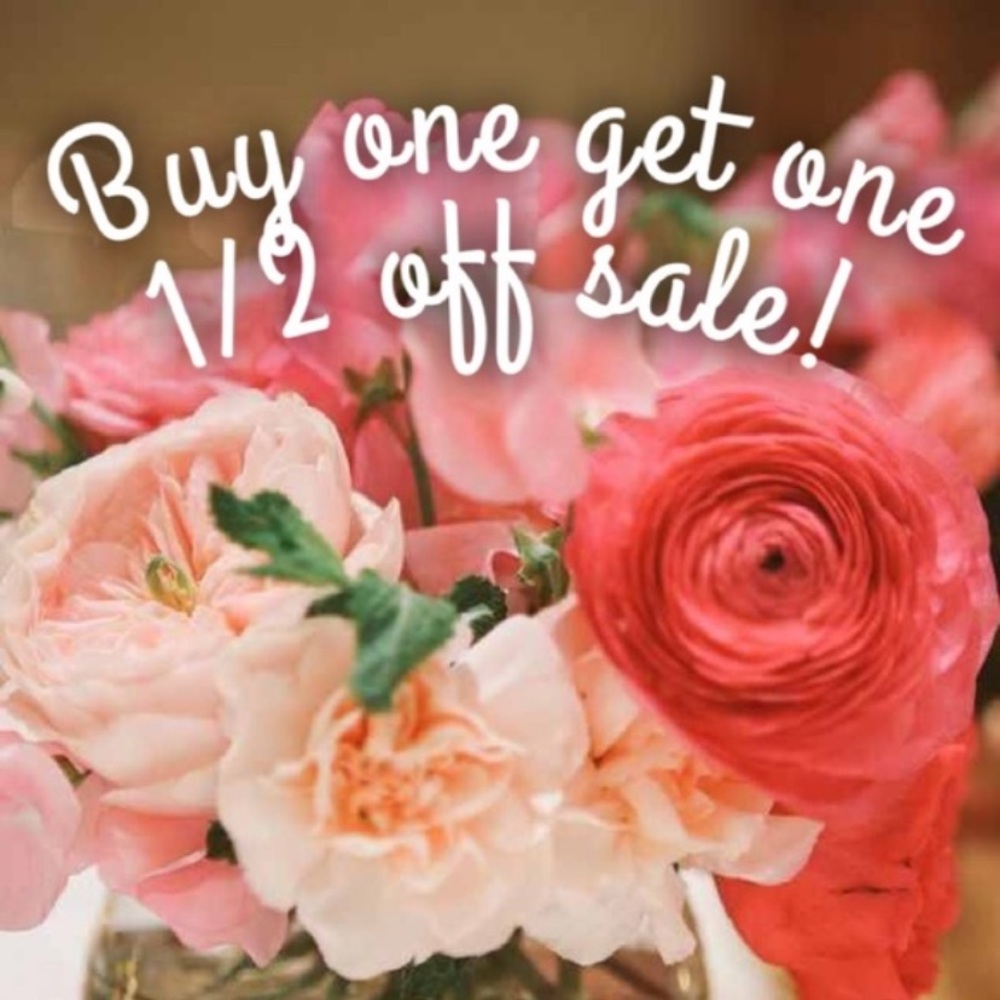 Buy 1 get 1 1/2 off Tops.
